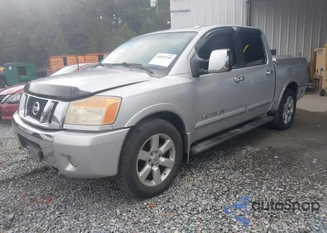 2011 Nissan Titan Sl z USA, uszkodzony, nr VIN 1N6BA0ED3BN313273